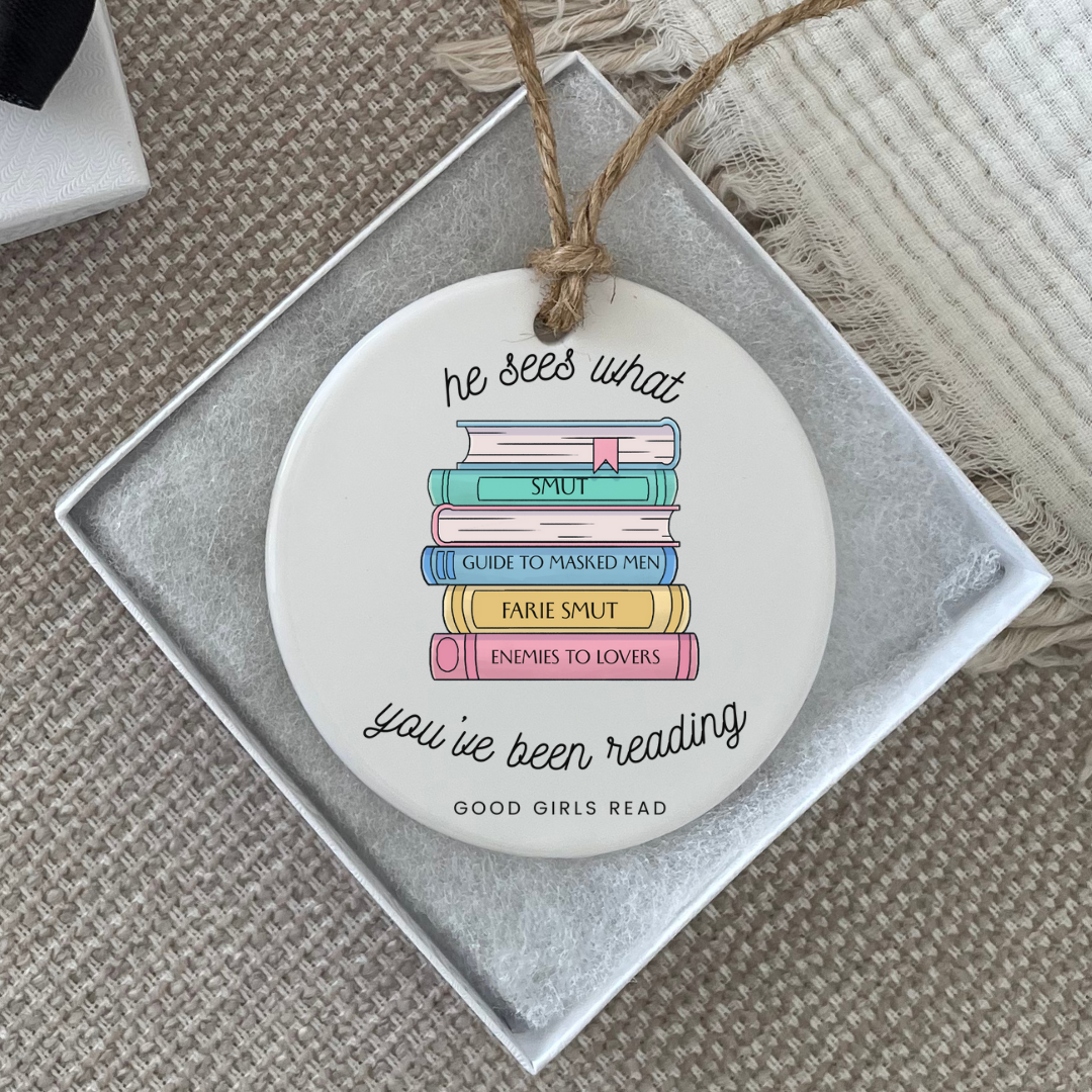 "he sees what you've been reading” Ceramic Ornament
